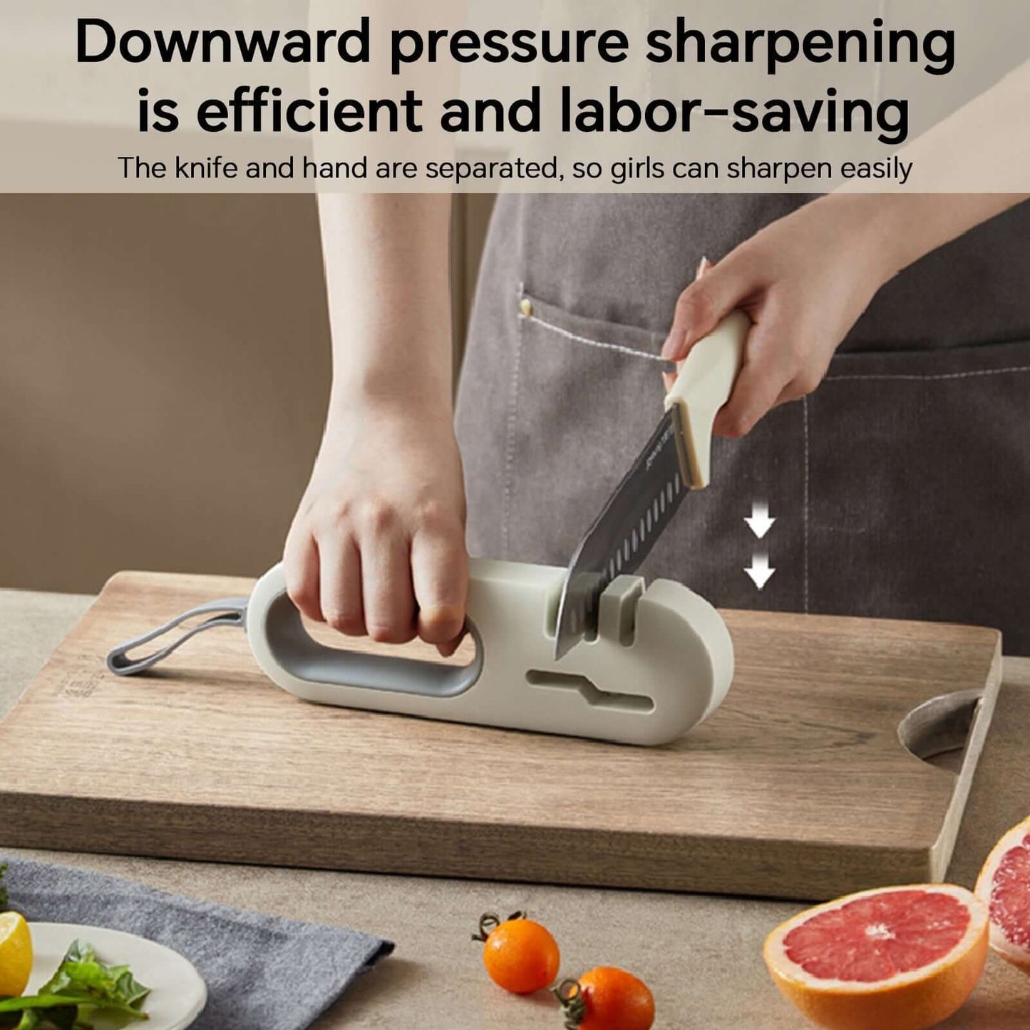 4-in-1 Kitchen Knife Sharpener - Professional Multi-Functional Blade Sharpening Tool with Non-Slip Base in use on a wooden cutting board.