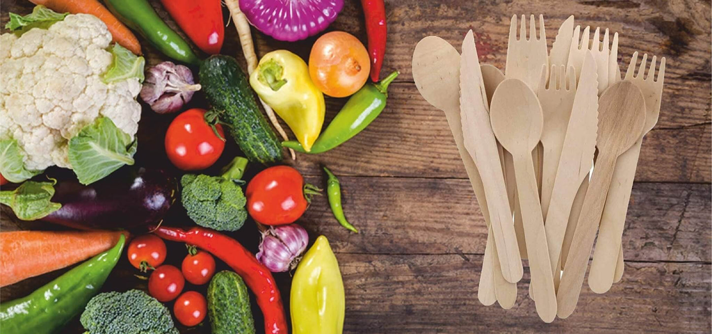 Bosnal Wooden Disposable Cutlery Set - 100 Pcs Biodegradable Compostable Utensils alongside fresh vegetables.
